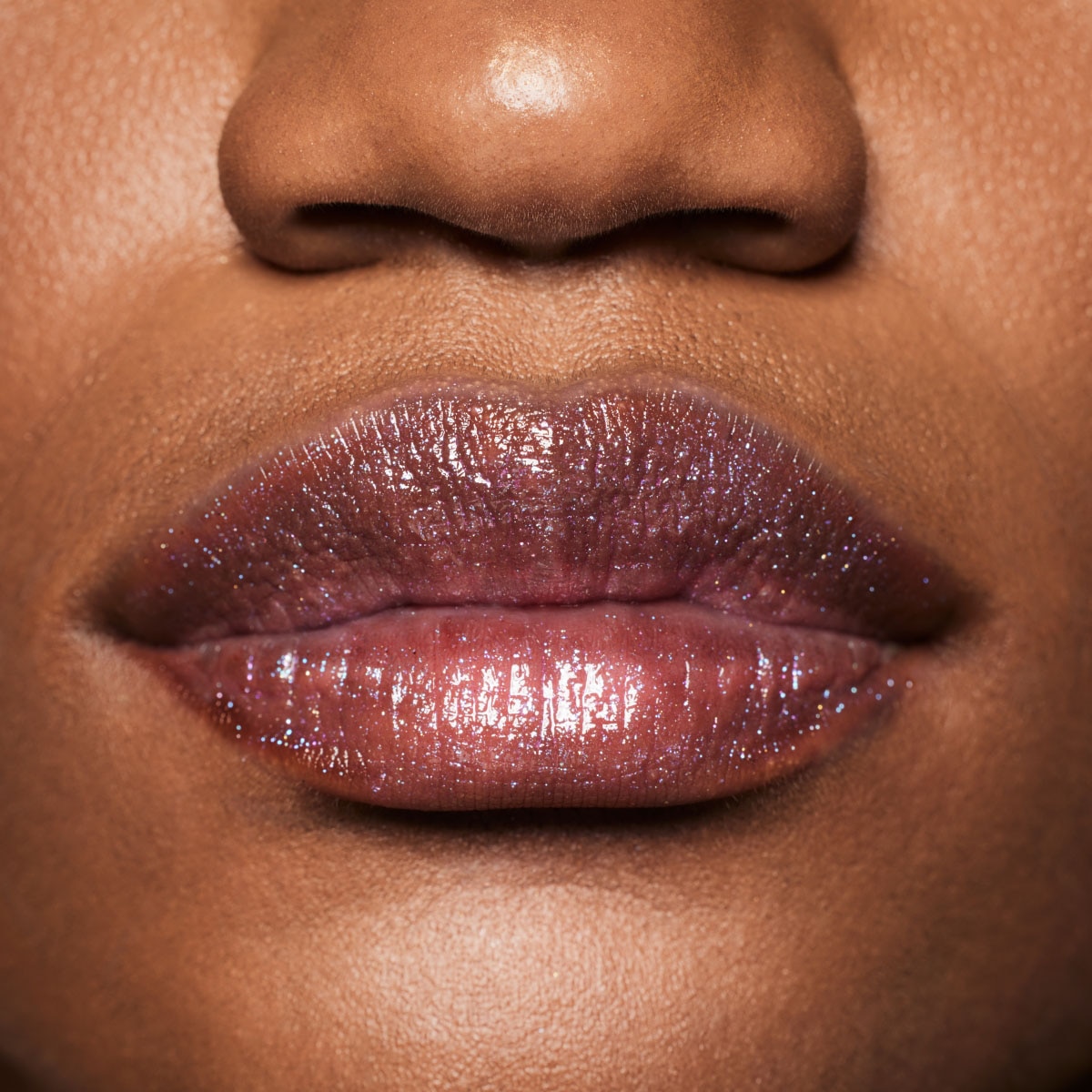 GLOSS BOMB STIX SHIMMER (LABIAL CON ACABADO BRILLOSO)